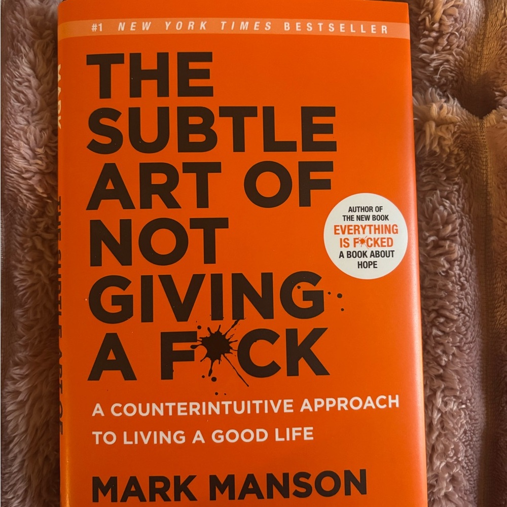 The Subtle Art of Not Giving a F*ck by Mark Manson - Orange Cover